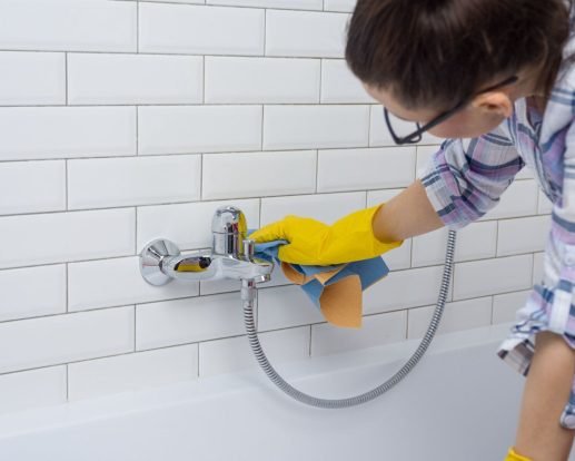 House cleaning. Woman is cleaning in the bathroom at home